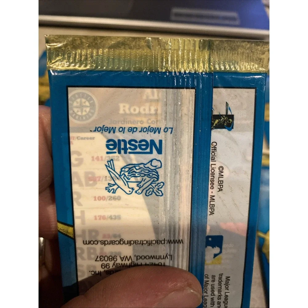 1998 Pacific Nestle Unopened Packs (7). HOF Visible On Back P. Martinez & Others